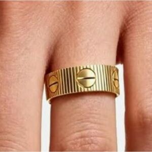 Luxurious gold ring with screw motifs - NEW